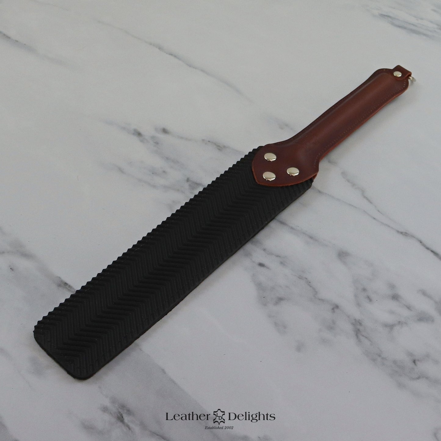 Punishment Paddle - Animal Print Sheepskin & Black Ripple Rubber