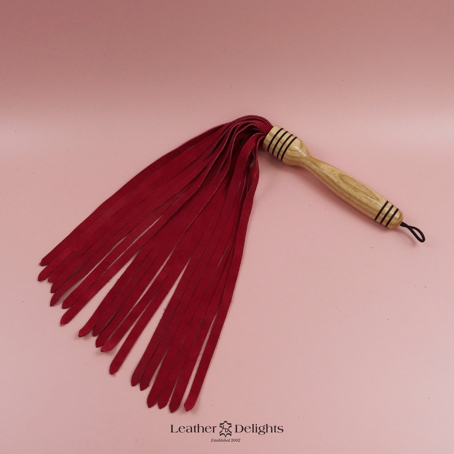 Flogger en daim orange coucher de soleil