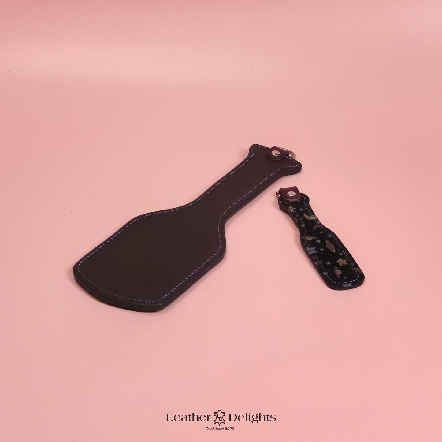 Intimidator Paddle - Black Leather with Moon & Stars and Purple Stitching