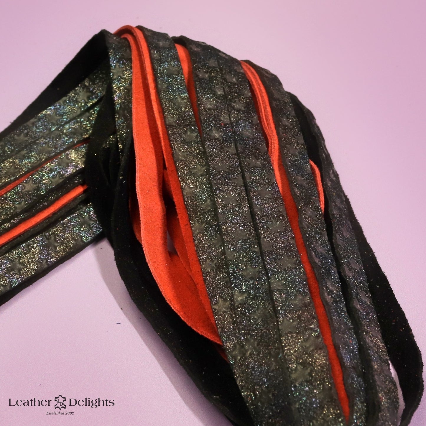 Torture Chamber Flogger - Rainbow Metallic Embossed Star & Red Suede