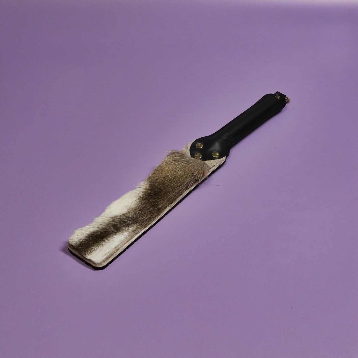 Punishment Paddle - Black Tyre Tread Rubber & Hair on Hide Reindeer with  Brass Hardware